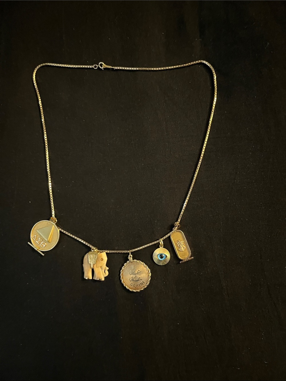 14 kt Charm Necklace with Coin, Elephant & Evil Eye